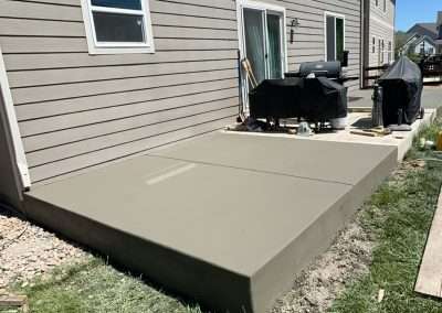 ECB Concrete Backyard Concrete Patio Newly Poured Smooth Finish Concrete Patios