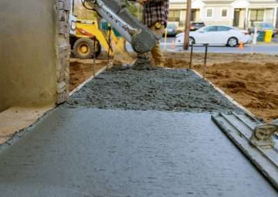 ECB Concrete Curved Concrete Sidewalk Path Through Grass Landscape Concrete Driveways & Sidewalks